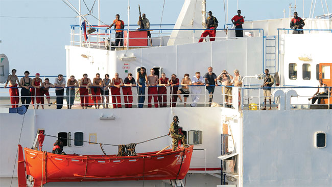 Faina crew and Somali pirates following the ships capture in 2008